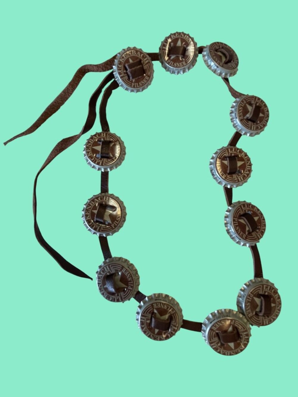 Bottle Cap Headband for hat With Luckenbach Pilsner Caps On Brown Leather